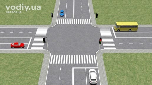 Регульоване перехрестя з автомобілями, автобусом, світлофорами та пішохідними переходами, межі перехрещення доріг на одному рівні.