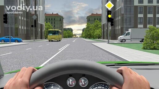 Проїзд перехрестя з миготливим жовтим сигналом світлофора та дорожнім знаком 2.3 «Головна дорога»