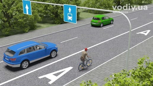 Рух велосипедиста по смузі для маршрутних транспортних засобів, дорожні знаки 5.11, 5.18 та горизонтальна дорожня розмітка 1.27