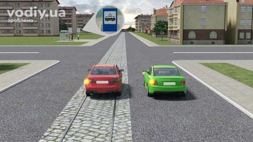 Поворот ліворуч з трамвайної колії попутного напрямку, дорожній знак 5.46.1 «Пункт зупинки трамвая», рух по трамвайних коліях на перехресті.