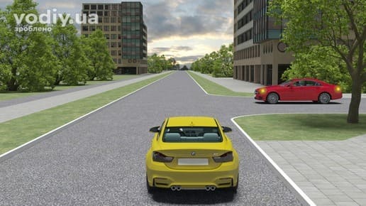 Червоний та жовтий автомобілі на нерегульованому перехресті рівнозначних доріг, черговість проїзду за правилом правої руки.