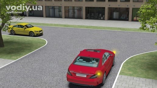 Червоний та жовтий автомобілі на нерегульованому перехресті рівнозначних доріг, у червоного авто ввімкнено правий покажчик повороту.