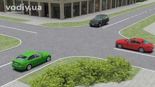 Червоний, зелений та чорний автомобілі на нерегульованому перехресті рівнозначних доріг без знаків пріоритету.