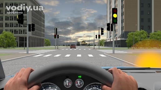 Вид з місця водія на нерегульоване перехрестя, жовтий миготливий сигнал світлофора та пішохідний перехід.