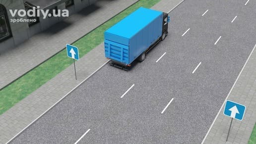 Вантажівка на лівому боці дороги з одностороннім рухом, дорожній знак 5.5 «Дорога з одностороннім рухом», зупинка вантажного автомобіля в місті.