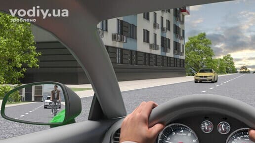 Безпечне відкривання дверей автомобіля, перевірка дзеркала заднього виду, велосипедист у боковому дзеркалі.