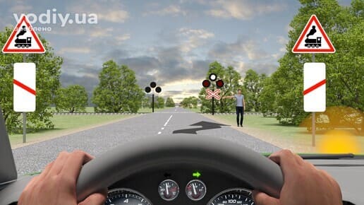 Дорожні знаки: 1.28, 1.31.6. Зупинка автомобіля перед залізничним переїздом, вигляд з місця водія, увімкнений правий покажчик повороту.