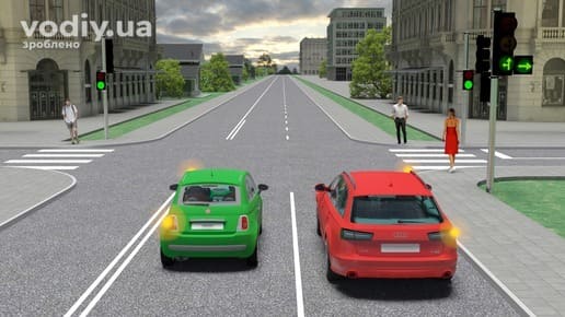 Зелений та червоний автомобілі з увімкненими покажчиками повороту на регульованому перехресті, зелений сигнал світлофора, пішоходи на переході.