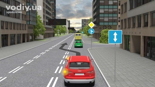 Червоний автомобіль перед виїздом на смугу з розміткою 1.9, вимкнений реверсивний світлофор, дорожні знаки 5.13, 2.3, 4.1.